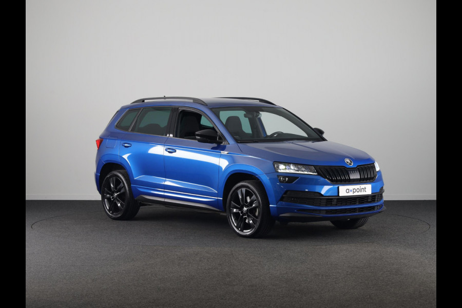 Škoda Karoq 1.5 TSI ACT Sportline Business 150pk | Wegklapbare trekhaak | Navigatie | Parkeercamera | Led koplampen