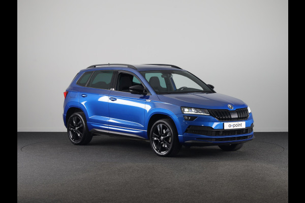 Škoda Karoq 1.5 TSI ACT Sportline Business 150pk | Wegklapbare trekhaak | Navigatie | Parkeercamera | Led koplampen