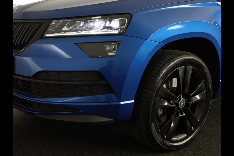 Škoda Karoq 1.5 TSI ACT Sportline Business 150pk | Wegklapbare trekhaak | Navigatie | Parkeercamera | Led koplampen
