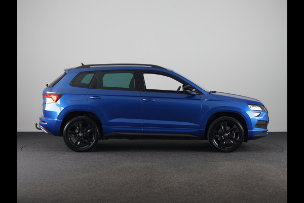 Škoda Karoq 1.5 TSI ACT Sportline Business 150pk | Wegklapbare trekhaak | Navigatie | Parkeercamera | Led koplampen