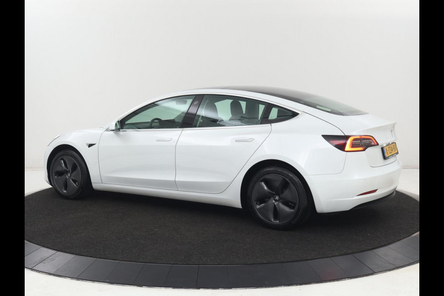 Tesla Model 3 Standard RWD Plus 60 kWh | SOH 87,7% | Autopilot | Trekhaak | Panoramadak | Leder | Stoelverwarming | Full LED | Camera | Navigatie | Keyless