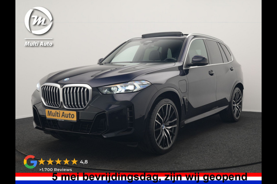 BMW X5 xDrive50e M Sport PHEV 490pk Dealer O.H. | Panodak Sky Lounge | Luchtvering | Head Up | 360 Camera | Harman / Kardon | Nappa Lederen Comfortstoelen Memory & Verwarmd | Carbon Schwarz | Apple Carplay | Keyless | Blis | 22"L.M | Plug In Hybrid |