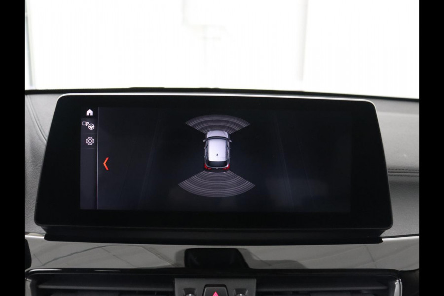 BMW X1 sDrive20i Business Edition Plus | Leder | Head-Up | Trekhaak | Stoelverwarming | Carplay | Sfeerverlichting | Full LED | Navigatie | Sportstoelen | Climate control | Parkeerhulp | Cruise control