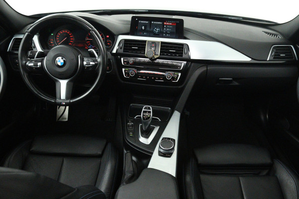 BMW 3 Serie Touring 320i Edition M Sport Shadow High Executive (PANORAMADAK, STOELVERWARMING, CAMERA, CRUISE CONTROL, NAVIGATIE)