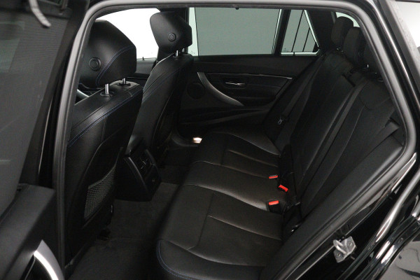 BMW 3 Serie Touring 320i Edition M Sport Shadow High Executive (PANORAMADAK, STOELVERWARMING, CAMERA, CRUISE CONTROL, NAVIGATIE)