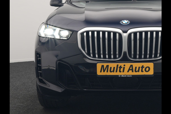BMW X5 xDrive50e M Sport PHEV 490pk Dealer O.H. | Panodak Sky Lounge | Luchtvering | Head Up | 360 Camera | Harman / Kardon | Nappa Lederen Comfortstoelen Memory & Verwarmd | Carbon Schwarz | Apple Carplay | Keyless | Blis | 22"L.M | Plug In Hybrid |