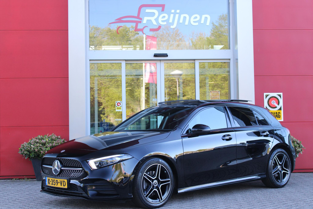 Mercedes-Benz A-Klasse 180 BUSINESS SOLUTION AMG | PANORAMA SCHUIF/KANTEL DAK | SFEER VERLICHTING | ELEKTRISCH VERSTELBARE VOORSTOELEN MET GEHEUGEN FUNCTIE | STOEL VERWARMING OP BEIDE VOORSTOELEN | MULTIBEAM LED KOPLAMPEN | ACHTERUITRIJ CAMERA | APPLE CARPLAY/ANDROID AUTO | NAVIGATIE | KEYLESS GO | CRUISE CONTROL | NIGHT PAKKET | VERKEERSLICHTEN WEERGAVE | 17" LICHTMETALEN VELGEN AMG | HEMELBEKLEDING ZWART | MBUX MULTIMEDIA SYSTEEM | SPORTSTOELEN | PARKEERSENSOREN VOOR + ACHTER |