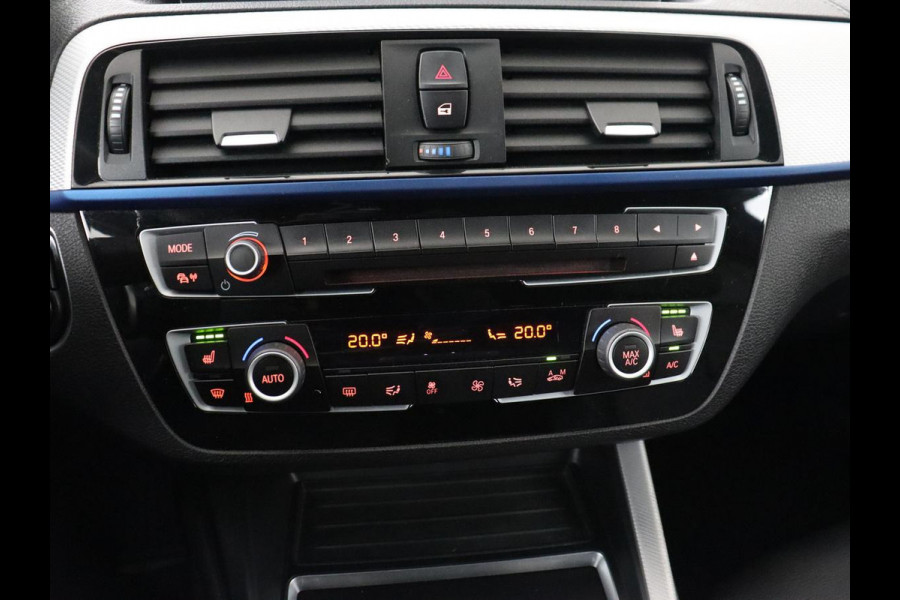 BMW 1-serie M140i High Executive | Stoelverwarming | Carplay | Leder | Adaptief LED | Keyless | Navigatie | Sportstoelen | Parkeerhulp | Climate control | Cruise control | Bluetooth | Getint glas | M Sport