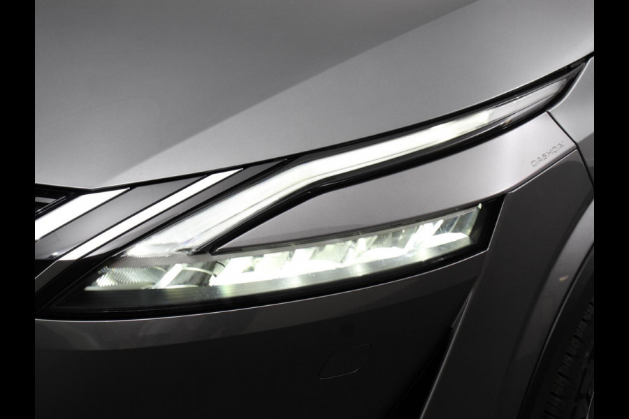 Nissan QASHQAI 1.3 MHEV Xtronic Tekna Plus Automaat Navigatie Apple Carplay/Android Auto Parkeersensoren 360 camera Adaptive cruise control Panoramadak Elektrische achterklep Elektrische bestuurderstoel Stoel-en stuurverwarming Ledverlichting Climate Control
