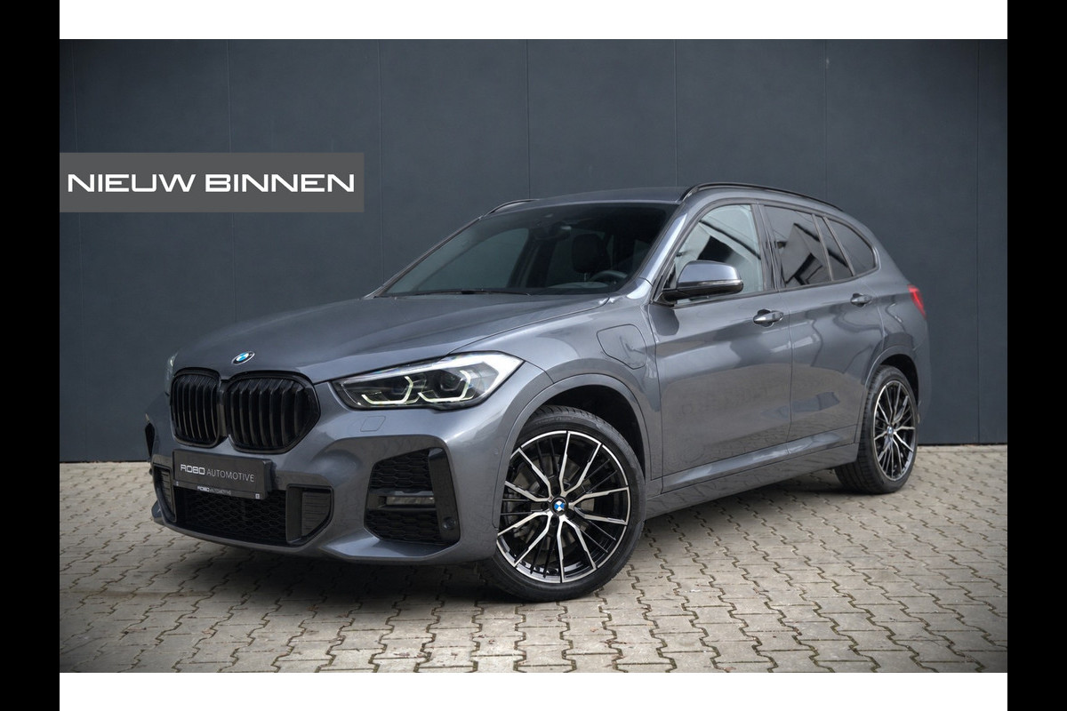 BMW X1 xDrive25e High Executive Edition M Sport | Stoelverwarming | Trekhaak | Parkeersensoren | Navigatie | Ambiance Verlichting | Keyless | Cruise Control | LED | Climate Control | DAB | BTW |