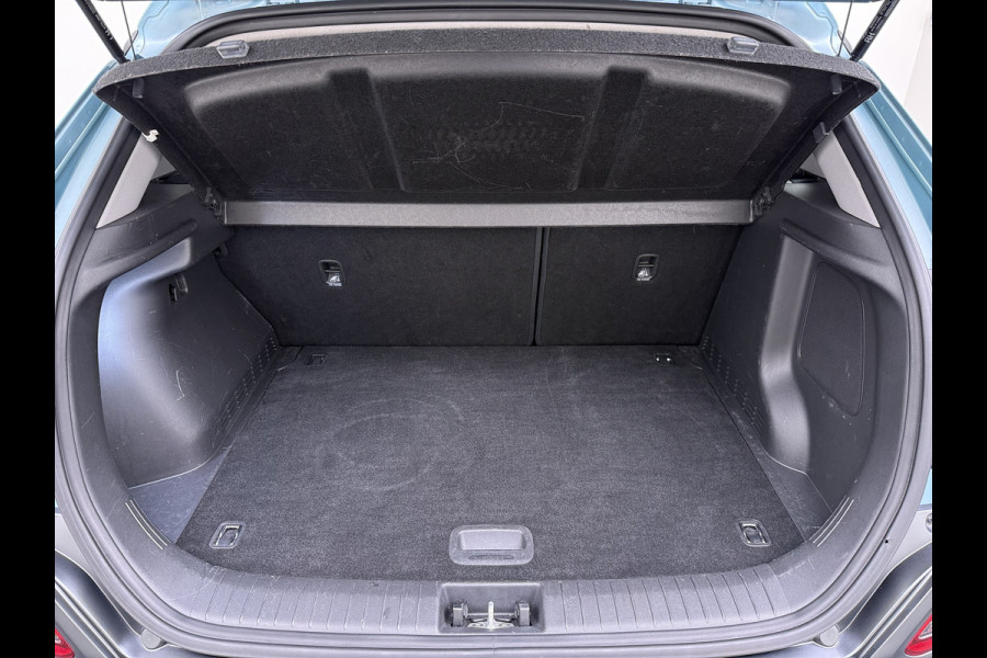 Hyundai Kona EV 64kWh 204pk Premium Warmtepomp Leer Head-Up Display Apple Carplay Android Navi Camera Elektr.Stoelen+Verwarmd+Ventilatie Adap Verwarmd Stuur Pdc Subwoofer Bluetooth Dodehoek detector Privacy Glas Rijstrooksensor Origineel Nederlandse EV