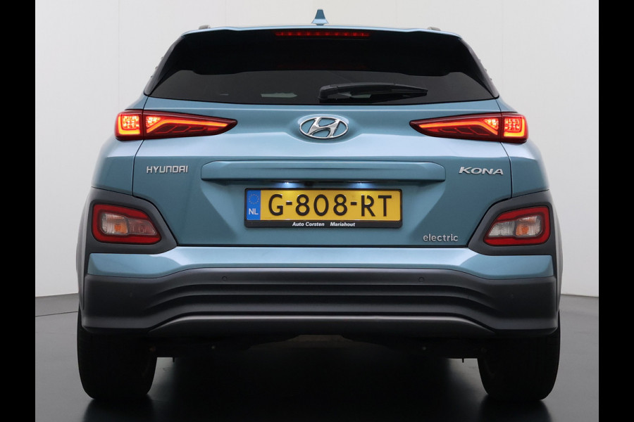 Hyundai Kona EV 64kWh 204pk Premium Warmtepomp Leer Head-Up Display Apple Carplay Android Navi Camera Elektr.Stoelen+Verwarmd+Ventilatie Adap Verwarmd Stuur Pdc Subwoofer Bluetooth Dodehoek detector Privacy Glas Rijstrooksensor Origineel Nederlandse EV