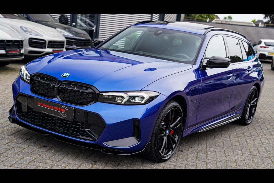 BMW 3 Serie Touring 330e xDrive M-pakket | Panorama | HuD | Sfeerverlichting | BMW LED | Camera | Portimao blau metallic |