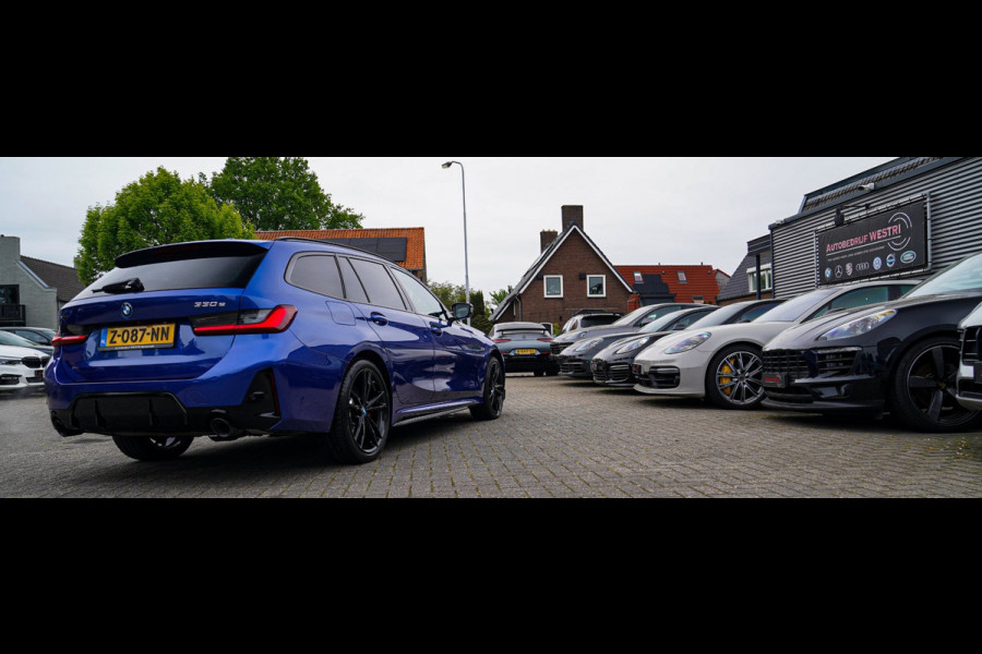BMW 3 Serie Touring 330e xDrive M-pakket | Panorama | HuD | Sfeerverlichting | BMW LED | Camera | Portimao blau metallic |