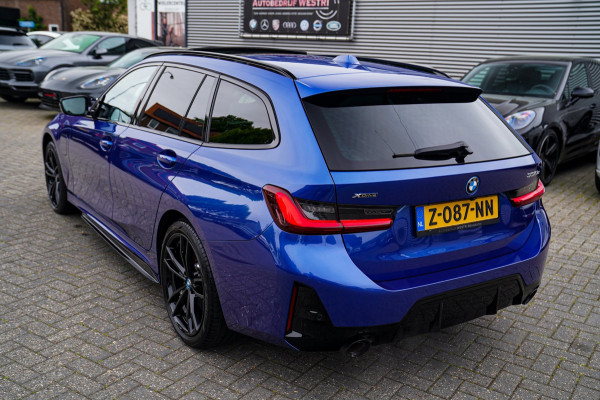 BMW 3 Serie Touring 330e xDrive M-pakket | Panorama | HuD | Sfeerverlichting | BMW LED | Camera | Portimao blau metallic |