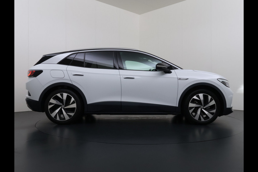 Volkswagen ID.4 First 82kWh Trekhaak Warmtepomp SOH 90% Adap.Cruise Stoelverwarming Apple Carplay Android Auto Navi Ecc Camera Lmv 20" Voorruitverwarming Privacy Glas Led DAB 1.000KG Trekgewicht Origineel Nederlandse Auto