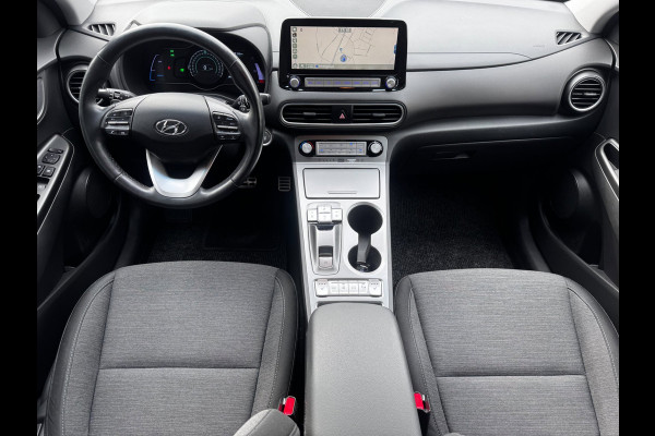 Hyundai Kona EV Comfort Smart 39 kWh | 100% SOH | Trekhaak | Camera | Stoel + Stuurverwarming | Navigatie