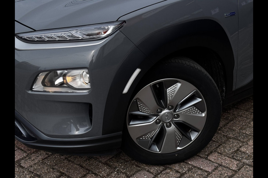 Hyundai Kona EV Comfort Smart 39 kWh | 100% SOH | Trekhaak | Camera | Stoel + Stuurverwarming | Navigatie