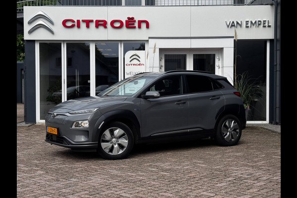 Hyundai Kona EV Comfort Smart 39 kWh | 100% SOH | Trekhaak | Camera | Stoel + Stuurverwarming | Navigatie