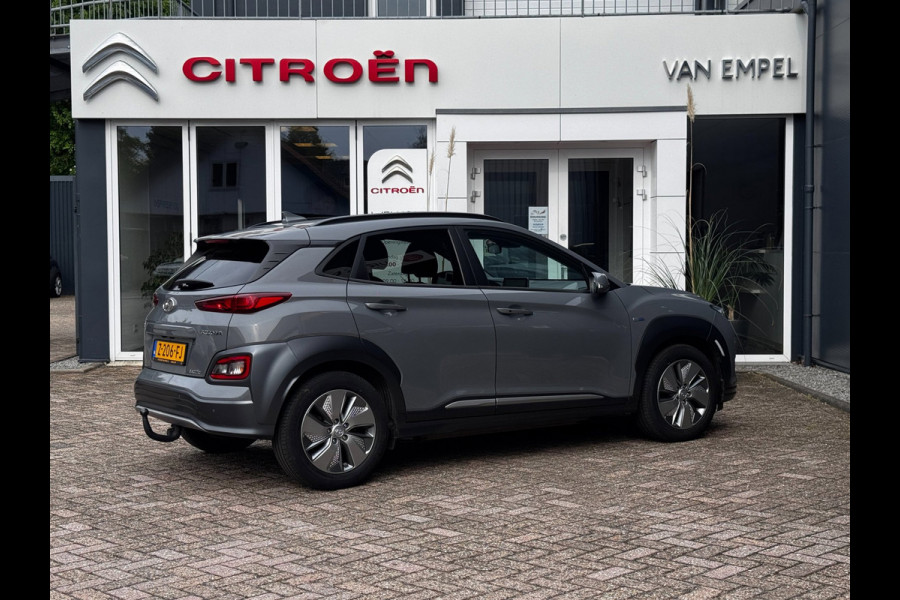Hyundai Kona EV Comfort Smart 39 kWh | 100% SOH | Trekhaak | Camera | Stoel + Stuurverwarming | Navigatie