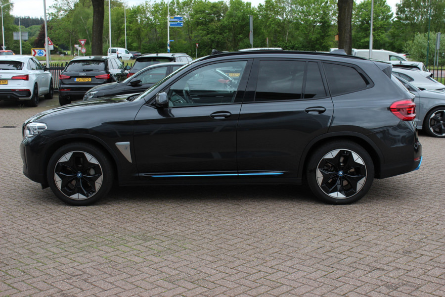 BMW iX3 High Executive 80 kWh / SoH 94,9% / Trekhaak / Panoramadak / 360Camera / Head-up / 20'' / Leder / Harman Kardon / Navigatie / Memory seats / Dodehoek / DAB / Stoelverwarming / Cruise Control Adaptief