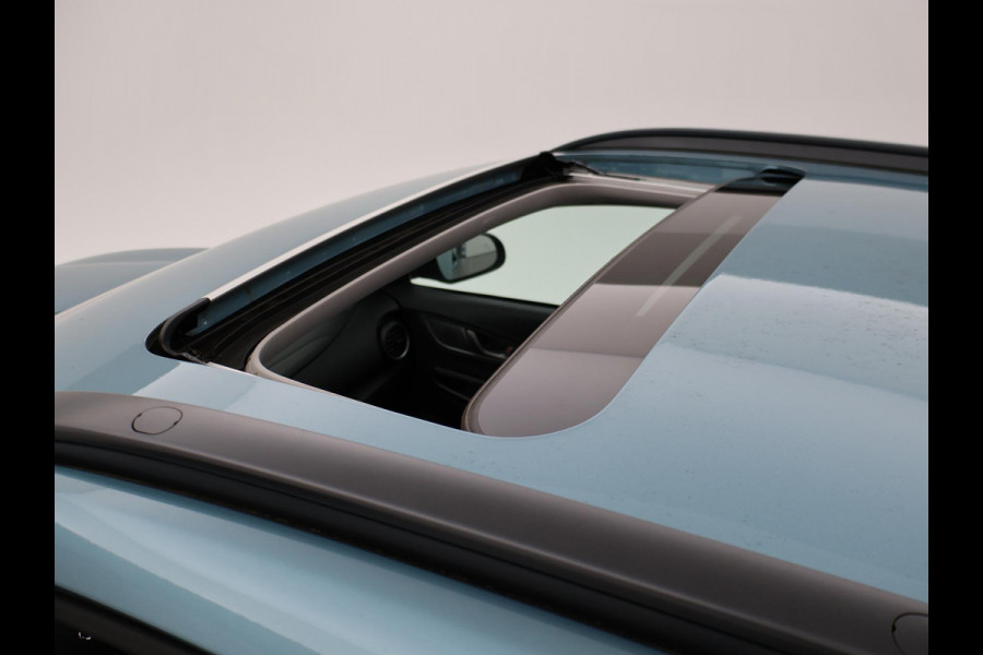 Hyundai Kona EV PREMIUM SKY 64 kWh 100% SOH *CERAMIC BLUE* + SCHUIFDAK | STOELVERW. V+A | STOELVENTILATIE | KRELL