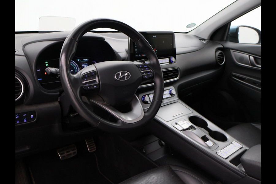 Hyundai Kona EV PREMIUM SKY 64 kWh 100% SOH *CERAMIC BLUE* + SCHUIFDAK | STOELVERW. V+A | STOELVENTILATIE | KRELL