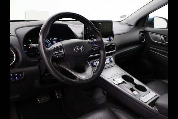 Hyundai Kona EV PREMIUM SKY 64 kWh 100% SOH *CERAMIC BLUE* + SCHUIFDAK | STOELVERW. V+A | STOELVENTILATIE | KRELL