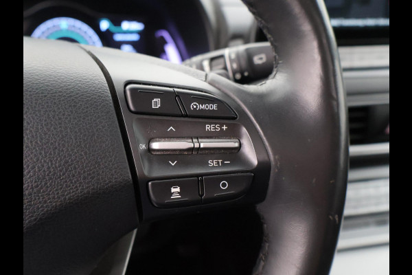 Hyundai Kona EV PREMIUM SKY 64 kWh 100% SOH *CERAMIC BLUE* + SCHUIFDAK | STOELVERW. V+A | STOELVENTILATIE | KRELL