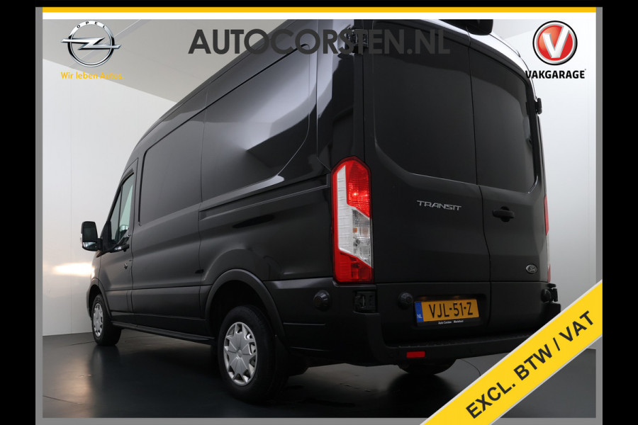 Ford Transit 310 2.0 TDCI L2H2 3-Persoons Camera Airco Stoelverwarming Elek.Stoel Cruise Control Pdc Lane Assist Trend Betonplex Vloer Wandbetimmering Schuifdeur Voorruitverwarming 1e Eigenaar Origineel Nederlandse Bus
