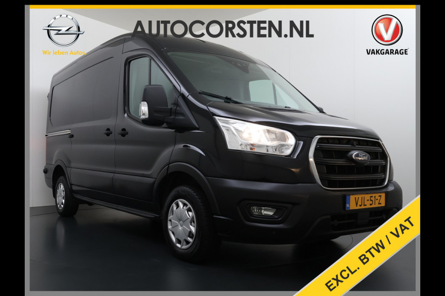 Ford Transit 310 2.0 TDCI L2H2 3-Persoons Camera Airco Stoelverwarming Elek.Stoel Cruise Control Pdc Lane Assist Trend Betonplex Vloer Wandbetimmering Schuifdeur Voorruitverwarming 1e Eigenaar Origineel Nederlandse Bus