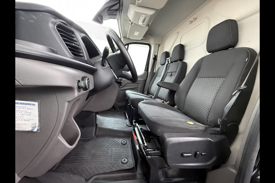 Ford Transit 310 2.0 TDCI L2H2 3-Persoons Camera Airco Stoelverwarming Elek.Stoel Cruise Control Pdc Lane Assist Trend Betonplex Vloer Wandbetimmering Schuifdeur Voorruitverwarming 1e Eigenaar Origineel Nederlandse Bus