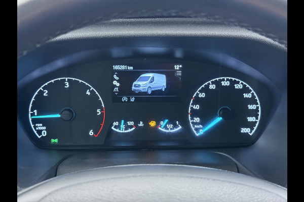 Ford Transit 310 2.0 TDCI L2H2 3-Persoons Camera Airco Stoelverwarming Elek.Stoel Cruise Control Pdc Lane Assist Trend Betonplex Vloer Wandbetimmering Schuifdeur Voorruitverwarming 1e Eigenaar Origineel Nederlandse Bus