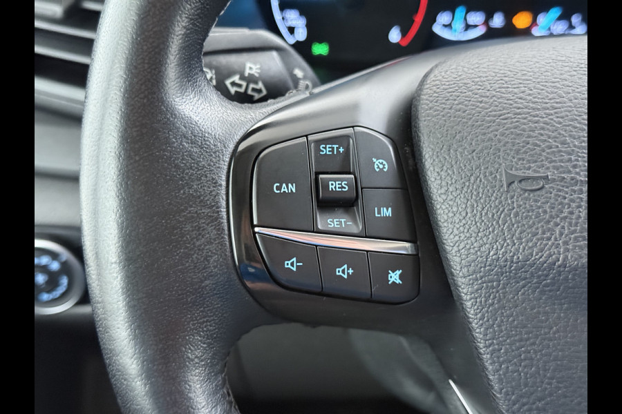 Ford Transit 310 2.0 TDCI L2H2 3-Persoons Camera Airco Stoelverwarming Elek.Stoel Cruise Control Pdc Lane Assist Trend Betonplex Vloer Wandbetimmering Schuifdeur Voorruitverwarming 1e Eigenaar Origineel Nederlandse Bus