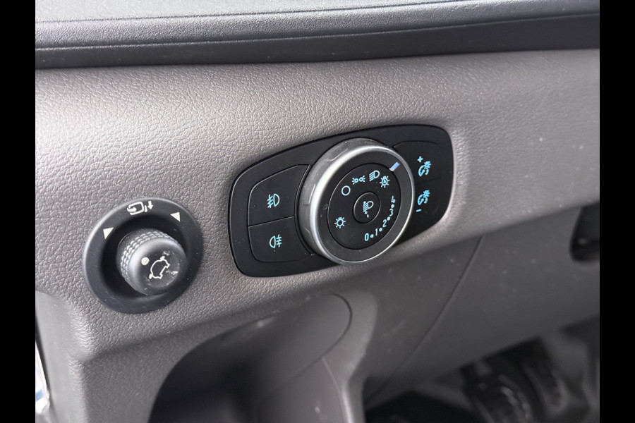 Ford Transit 310 2.0 TDCI L2H2 3-Persoons Camera Airco Stoelverwarming Elek.Stoel Cruise Control Pdc Lane Assist Trend Betonplex Vloer Wandbetimmering Schuifdeur Voorruitverwarming 1e Eigenaar Origineel Nederlandse Bus