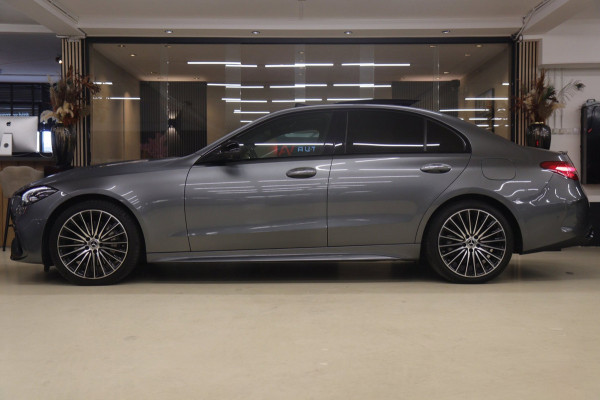 Mercedes-Benz C-Klasse 300 E AMG Line NAP/PANO/HUD/CARPLAY/SFEERVERLICHTING/MEM/BOMVOL