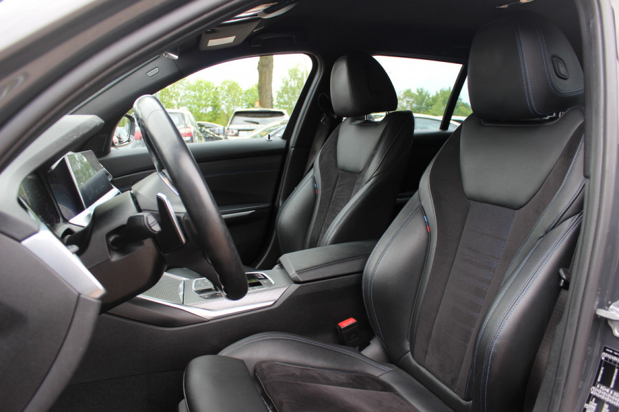 BMW 3 Serie Touring 330i High Exe. M Sport / M340 uitgevoerd / Leder&Alcantara / CarPlay / 19'' / Parkeerhulp V+A / Stoelverwarming / Sportstoelen / DAB / Cruise Control