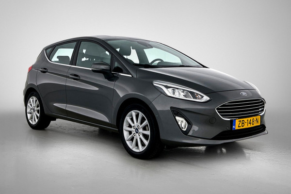 Ford Fiesta 1.0 EcoBoost Titanium (NAVIGATIE, CARPLAY, PARKEERSENSOREN, LED, STUURBEDIENING, 1e EIGENAAR, GOED ONDERHOUDEN)