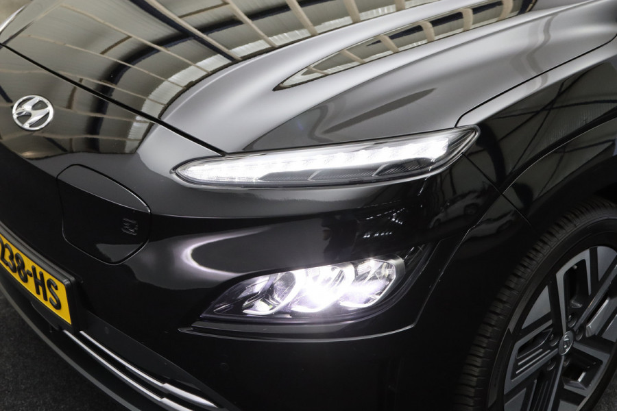 Hyundai Kona EV Premium 64 kWh 204 PK, SOH 100%, Leder, 4 x Stoelverwarming, Head-Up, Camera