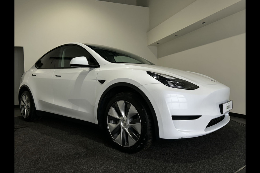 Tesla Model Y RWD 58 kWh | Leder Interieur | Houten afwerking | Verwarmde stoelen en stuur |  Soh (batterijcheck) Waarde 95,1 %