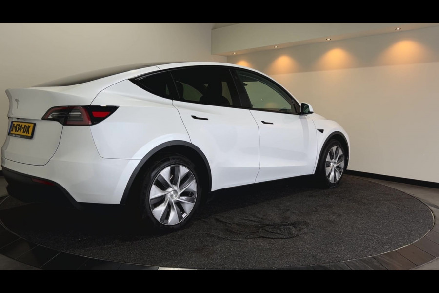 Tesla Model Y RWD 58 kWh | Leder Interieur | Houten afwerking | Verwarmde stoelen en stuur |  Soh (batterijcheck) Waarde 95,1 %