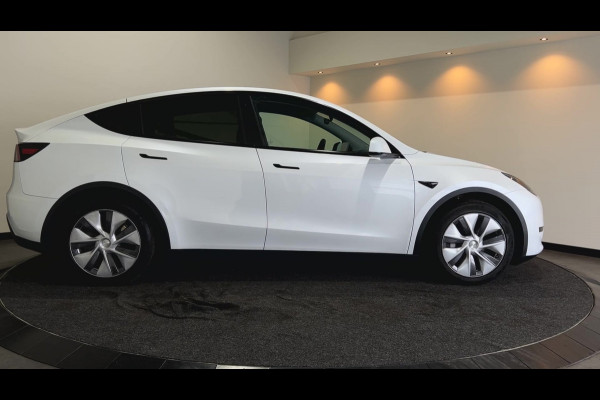 Tesla Model Y RWD 58 kWh | Leder Interieur | Houten afwerking | Verwarmde stoelen en stuur |  Soh (batterijcheck) Waarde 95,1 %