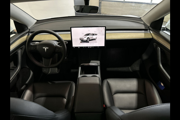 Tesla Model Y RWD 58 kWh | Leder Interieur | Houten afwerking | Verwarmde stoelen en stuur |  Soh (batterijcheck) Waarde 95,1 %
