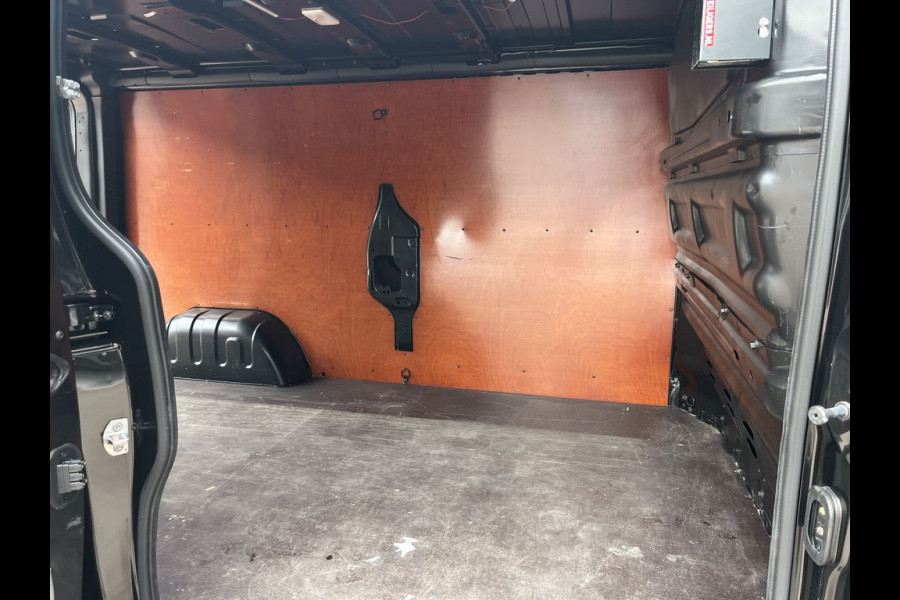 Renault Trafic 2.0 dCi 150pk E6 L2 Work Edition 3p Lease €372 p/m, Airco, Navi Carplay, PDC, Led, Imperiaal, Trekhaak, Cruise controle, Onderhoudshistorie aanwezig