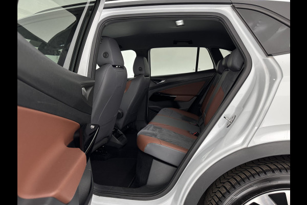 Volkswagen ID.4 Business 77 kWh [ 3-Fase-11kW ] {SOH-83%} (INCL-BTW) *LEATHER-ARTVELOURS | ADAPTIVE-CRUISE | FULL-LED | HEATED-COMFORTSEATS | KEYLESS | CAMERA | DIGI-COCKPIT | DAB | NAVI-FULLMAP | PRIVACY-GLASS | ECC | PDC | TOWBAR | 19''ALU*