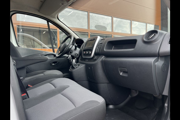 Renault Trafic 2.0 dCi 120pk L2 Work Edition Lease €253p/m, 2x Schuifdeur, Trekhaak, Airco, Navi, PDC, Led, Cruise controle, Onderhoudshistorie aanwezig