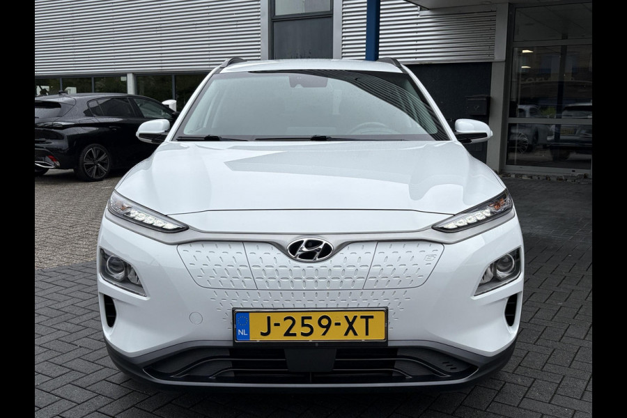 Hyundai Kona EV Fashion 64 kWh | 94,7% SOH | Trekhaak | Warmtepomp | Head-Up | 3Fase | Krell | Dodehoeksensoren | Camera |