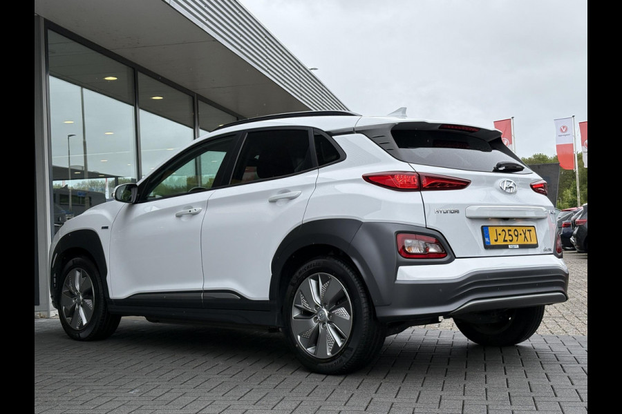 Hyundai Kona EV Fashion 64 kWh | 94,7% SOH | Trekhaak | Warmtepomp | Head-Up | 3Fase | Krell | Dodehoeksensoren | Camera |