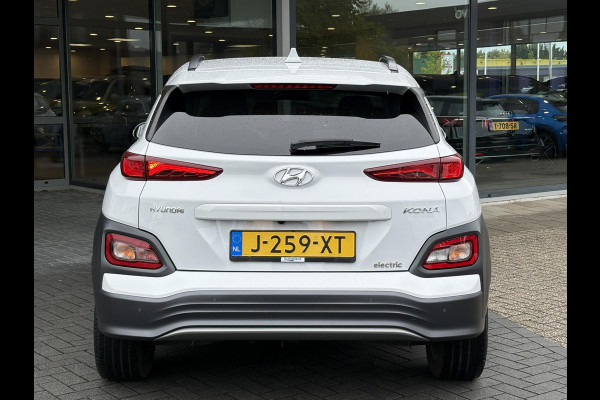 Hyundai Kona EV Fashion 64 kWh | 94,7% SOH | Trekhaak | Warmtepomp | Head-Up | 3Fase | Krell | Dodehoeksensoren | Camera |