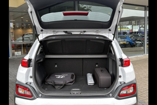 Hyundai Kona EV Fashion 64 kWh | 94,7% SOH | Trekhaak | Warmtepomp | Head-Up | 3Fase | Krell | Dodehoeksensoren | Camera |